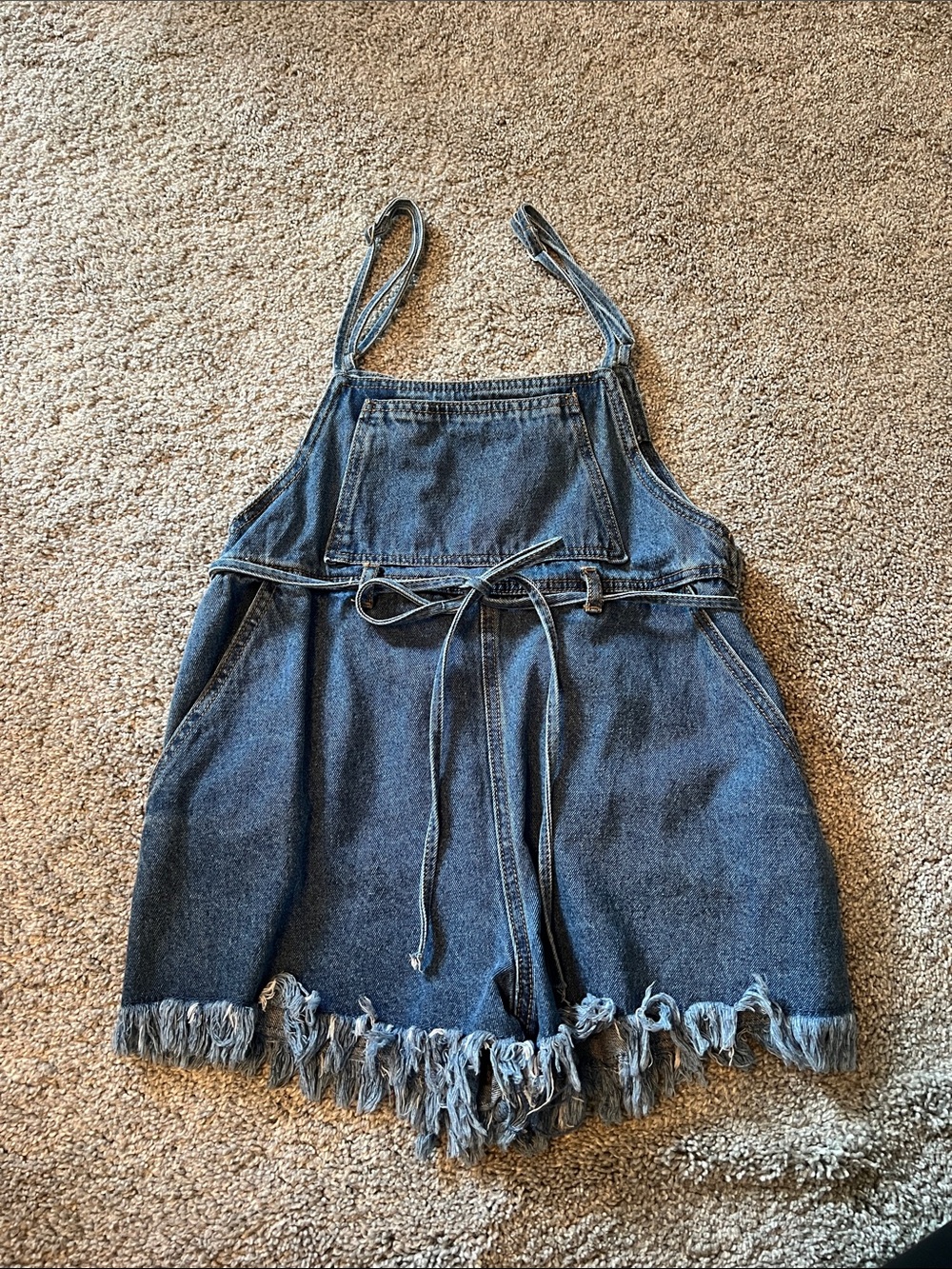 Blue denim frayed overalls
